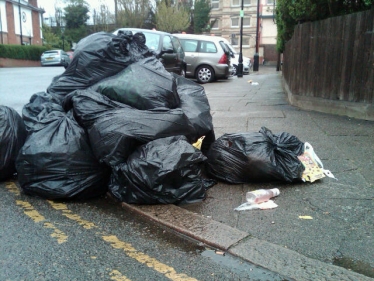 Rubbish piled up outside Hanwell station for over a week
